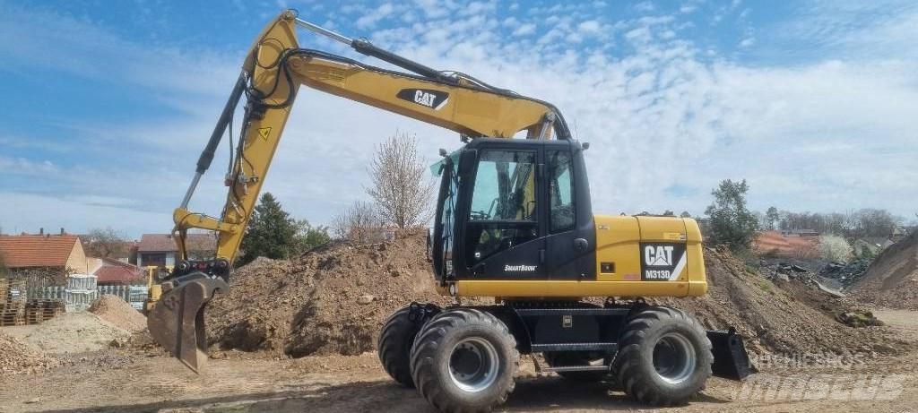 CAT M 313 D Gravemaskiner på hjul