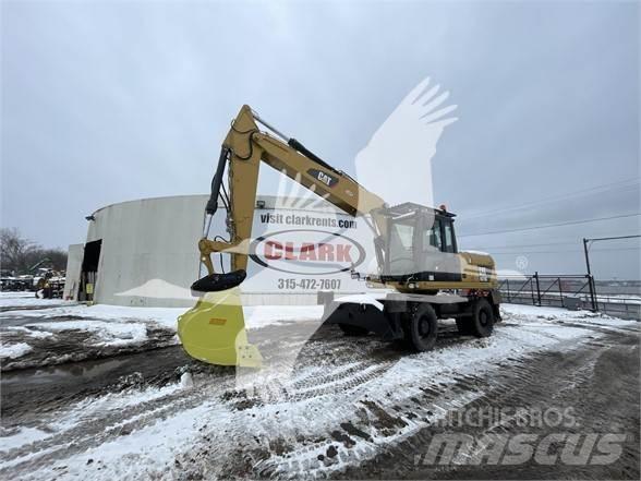CAT M318D Gravemaskiner på hjul