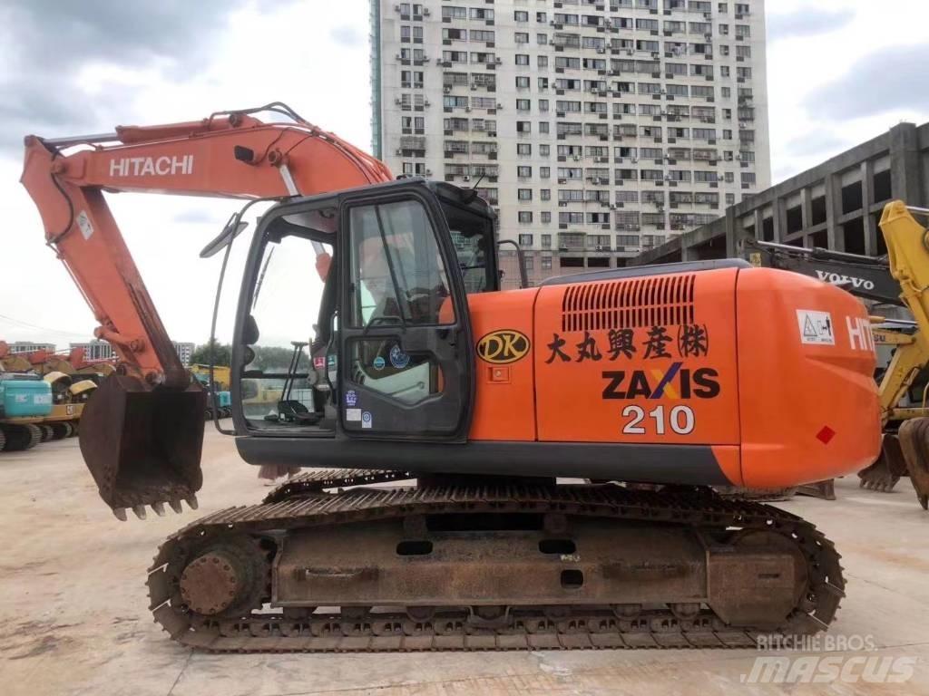 Hitachi ZX 210 Gravemaskiner på larvebånd