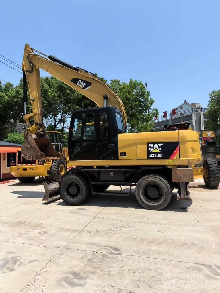CAT M 320 Gravemaskiner på hjul