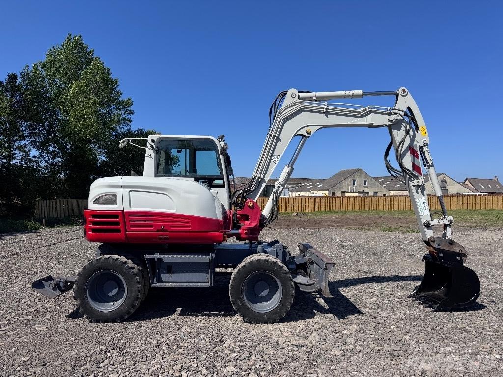Takeuchi TB 295 W Gravemaskiner på hjul