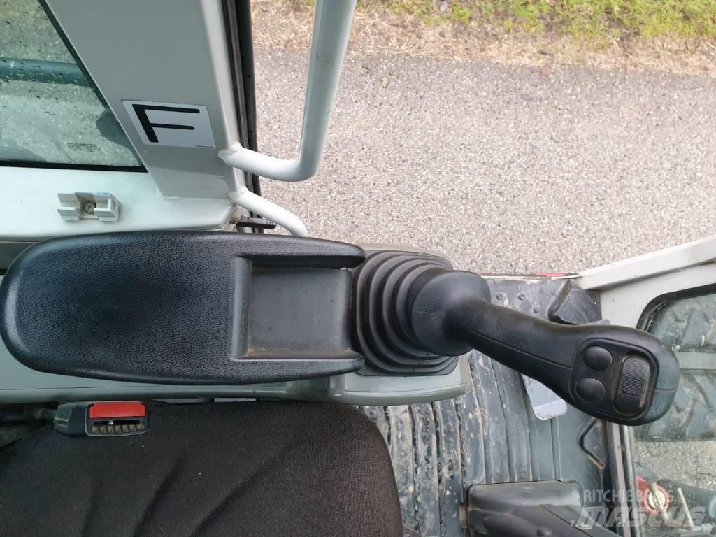Takeuchi TB 295 W Gravemaskiner på hjul