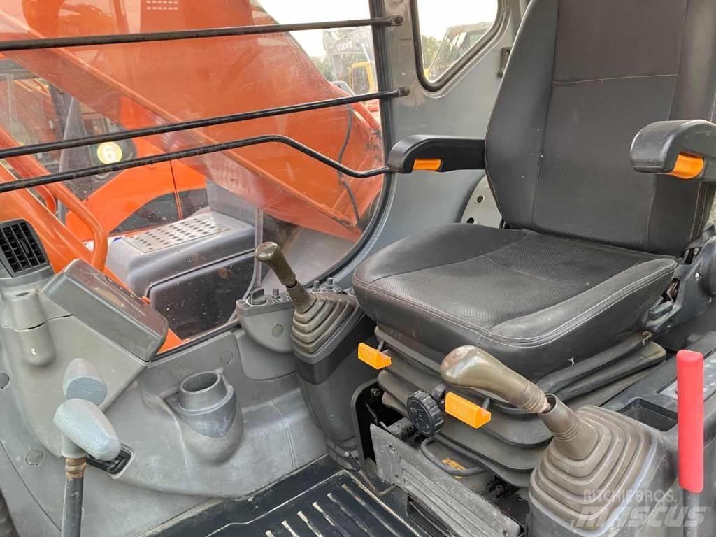 Hitachi ZX 210 Gravemaskiner på larvebånd