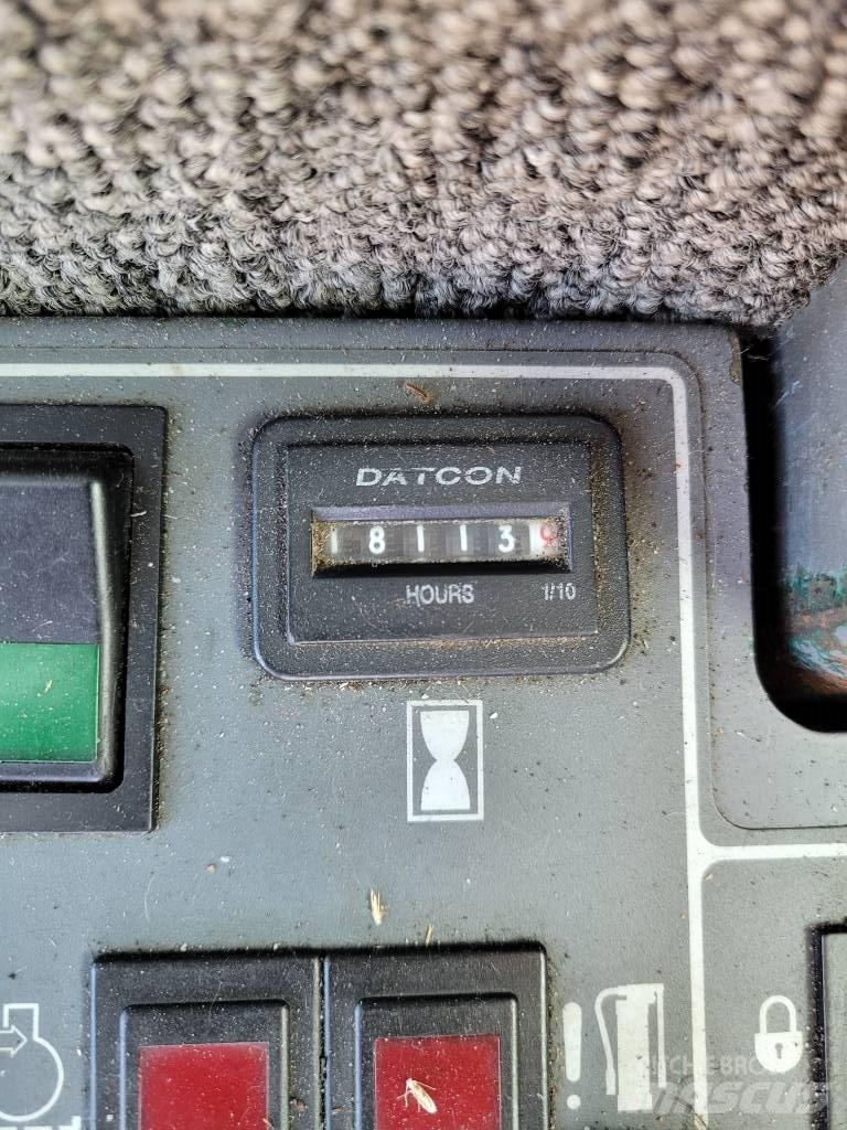 John Deere 853 Fældebunkelæggere