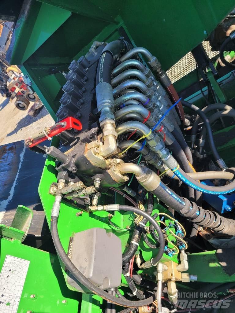 John Deere 853 Fældebunkelæggere