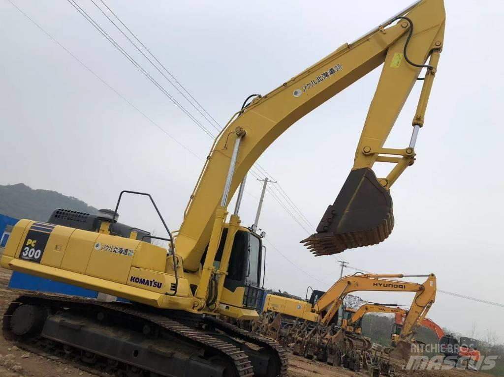 Komatsu 300-7 Gravemaskiner på larvebånd