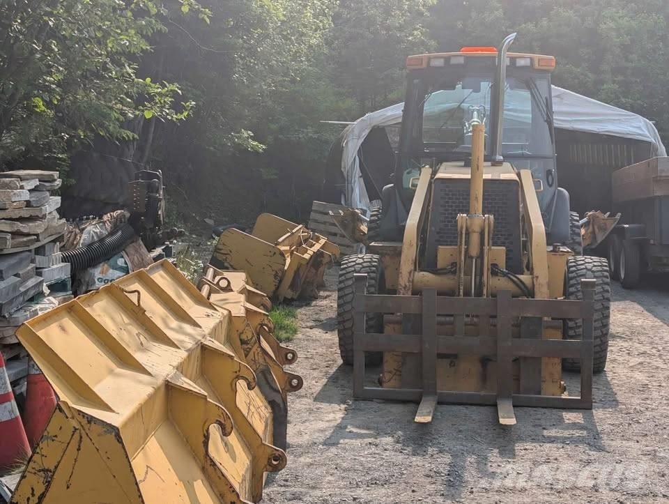 John Deere 310 SE Rendegravere