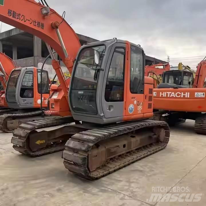 Hitachi ZX135US Gravemaskiner på larvebånd