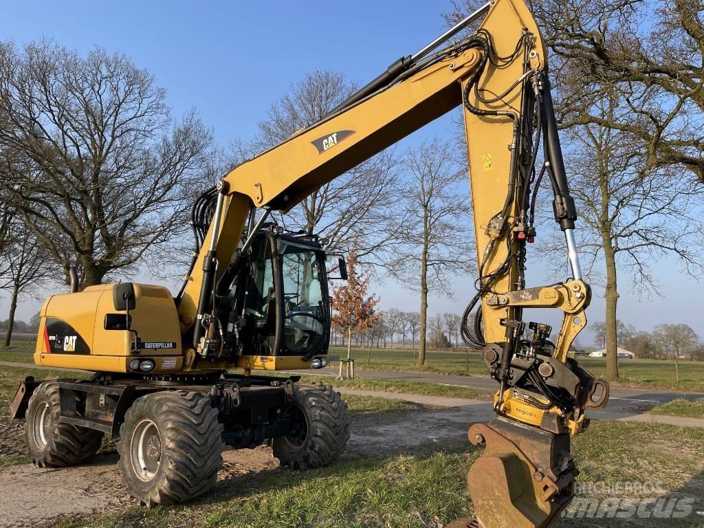 CAT M 313 D Gravemaskiner på hjul