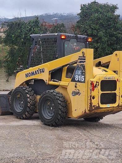 Komatsu SK815 Minilæsser - knækstyret