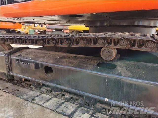 Hitachi EX 120 Gravemaskiner på larvebånd