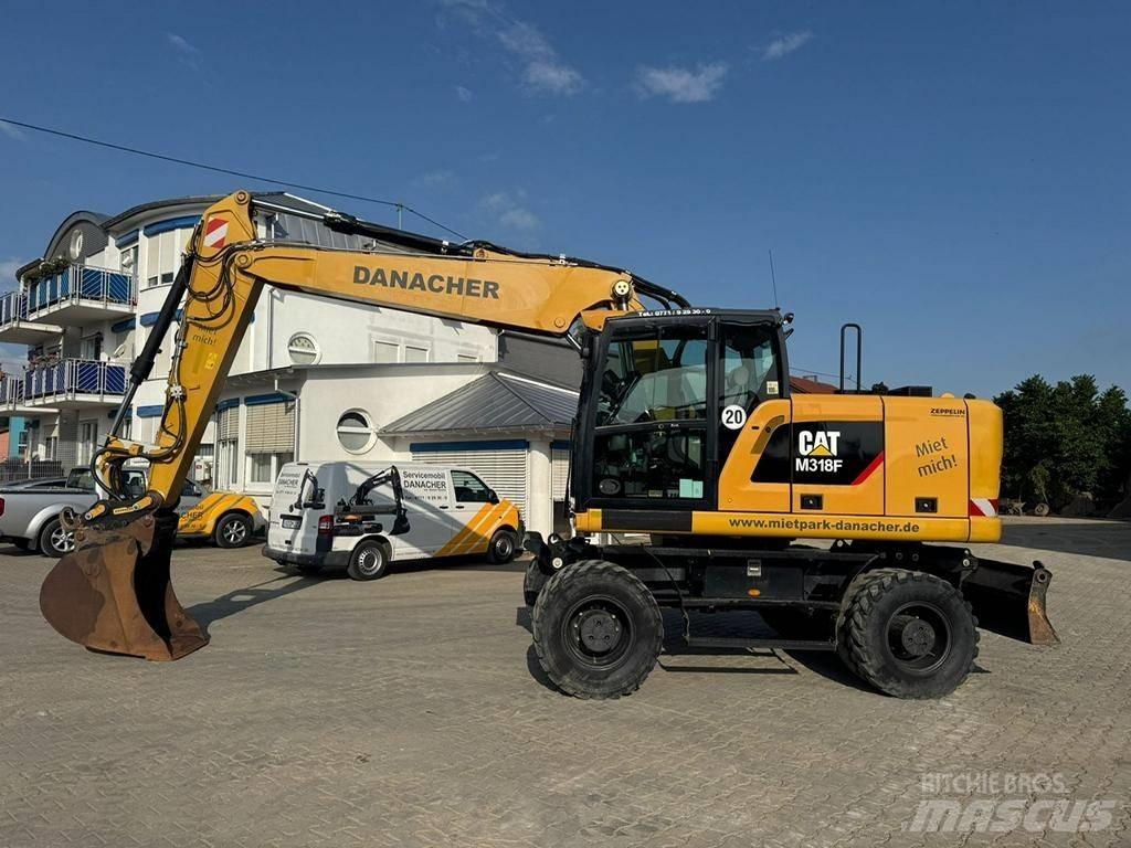 CAT M 318 F Gravemaskiner på hjul