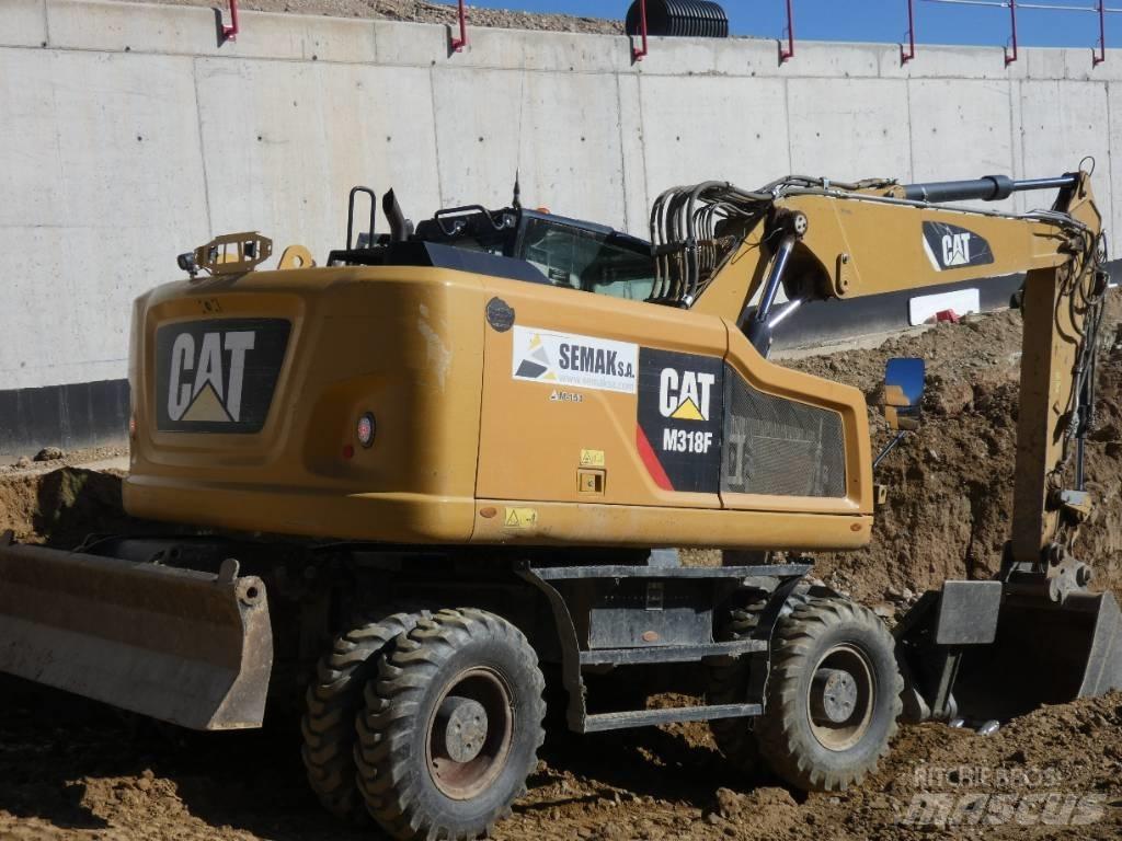CAT M 318 F Gravemaskiner på hjul