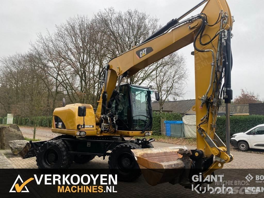 CAT M313D Gravemaskiner på hjul