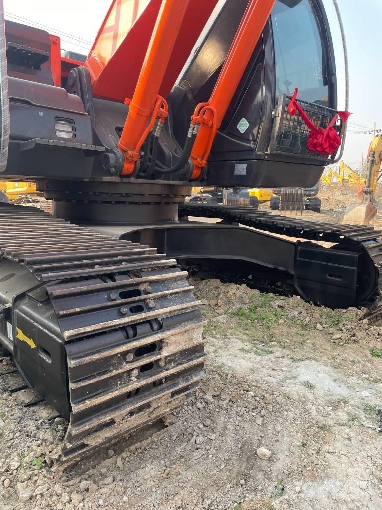 Hitachi ZX 210 Gravemaskiner på larvebånd