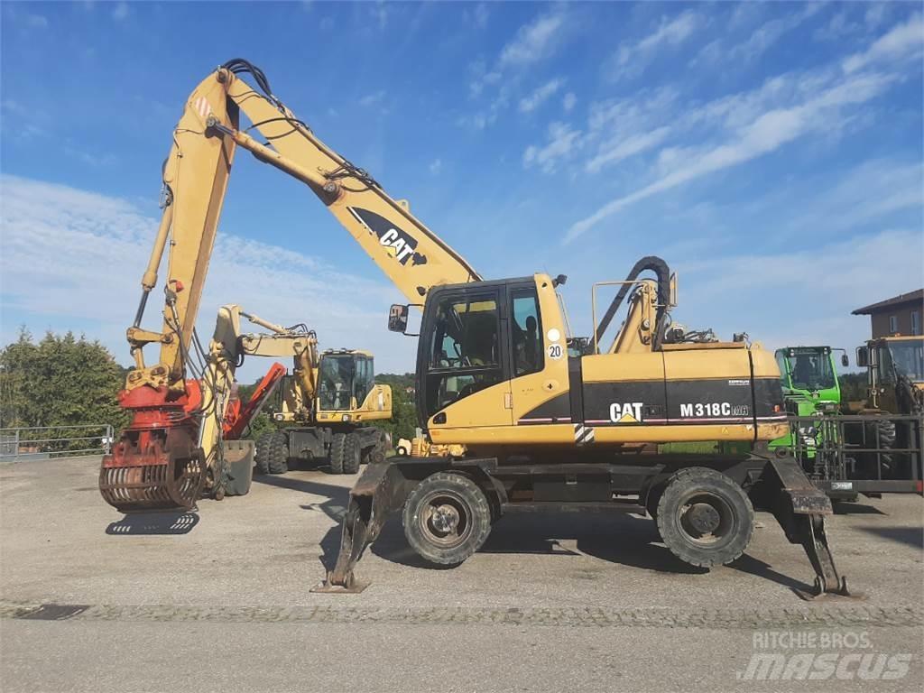 CAT M318C MH Gravemaskiner på hjul