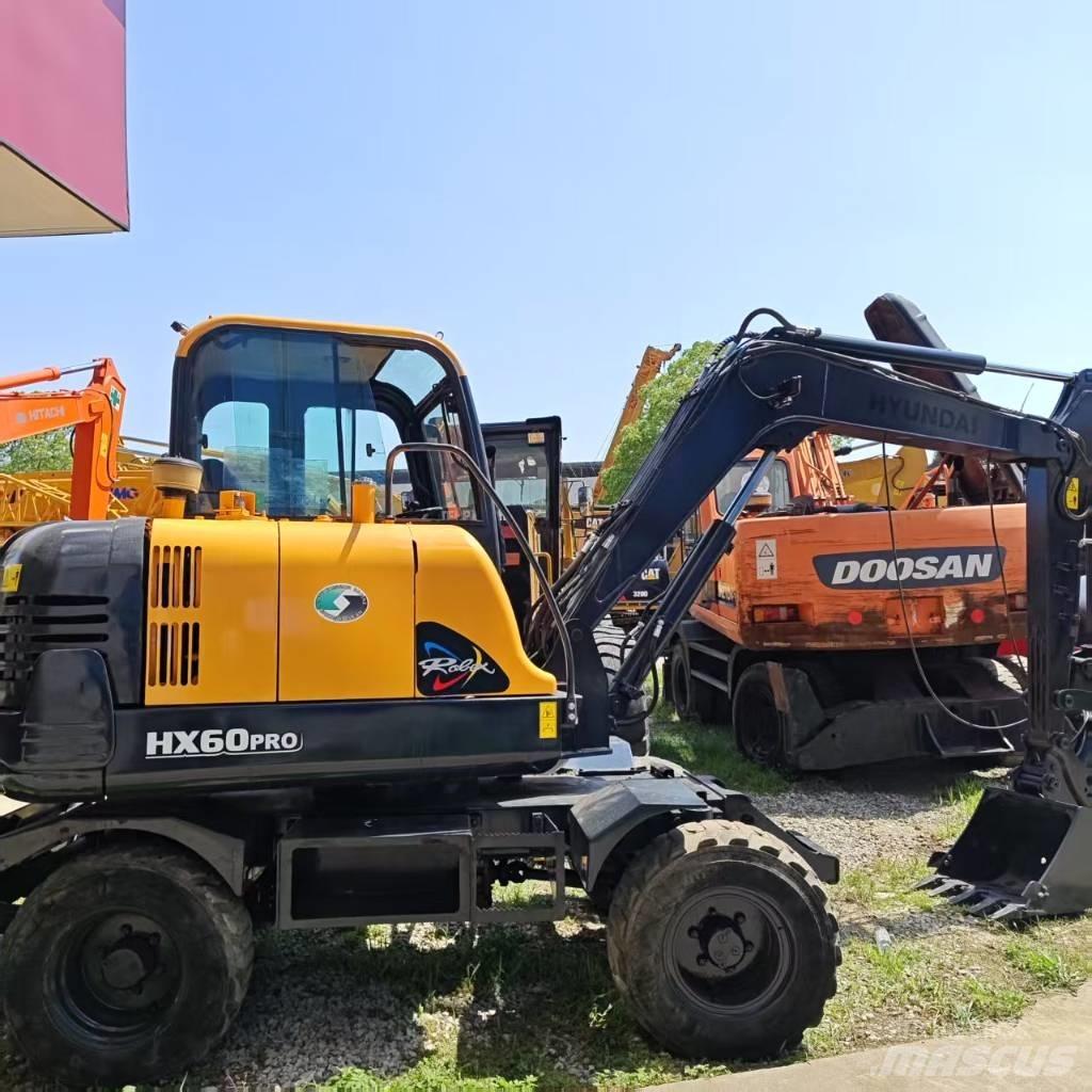 Hyundai HX 60w Gravemaskiner på hjul