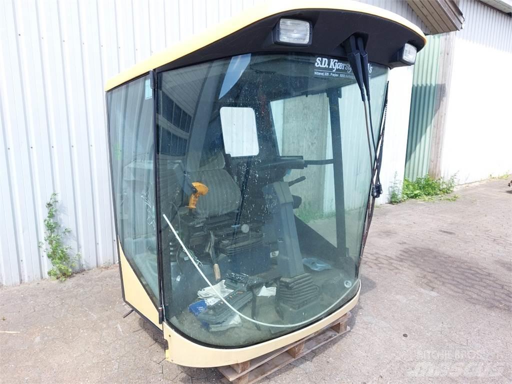 New Holland TX65 Kabiner og interiør