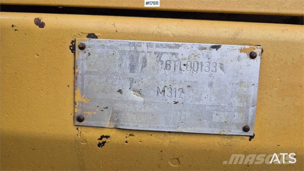 CAT M312 Gravemaskiner på hjul