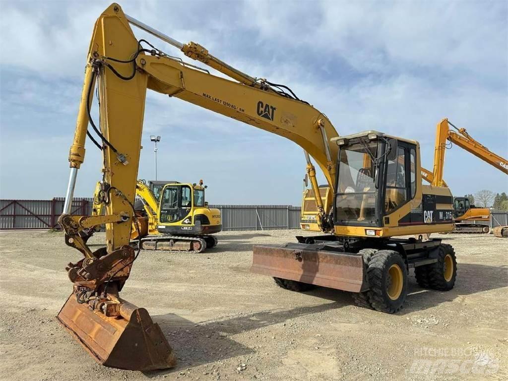 CAT M 315 Gravemaskiner på hjul