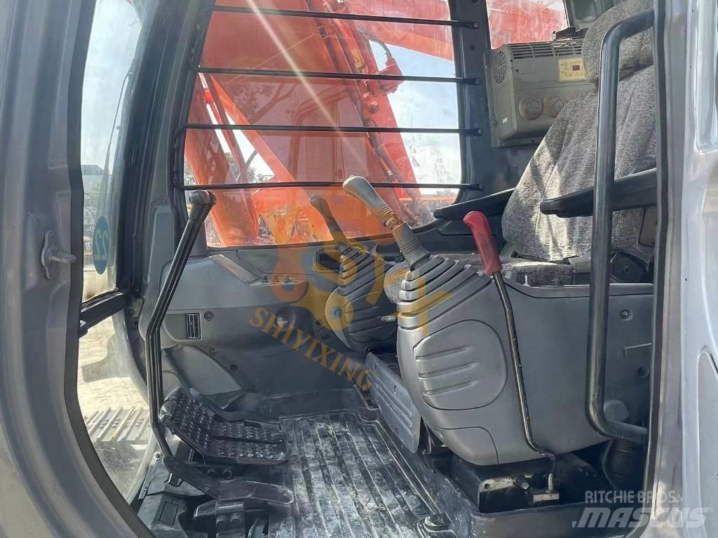 Hitachi EX 120 Gravemaskiner på larvebånd