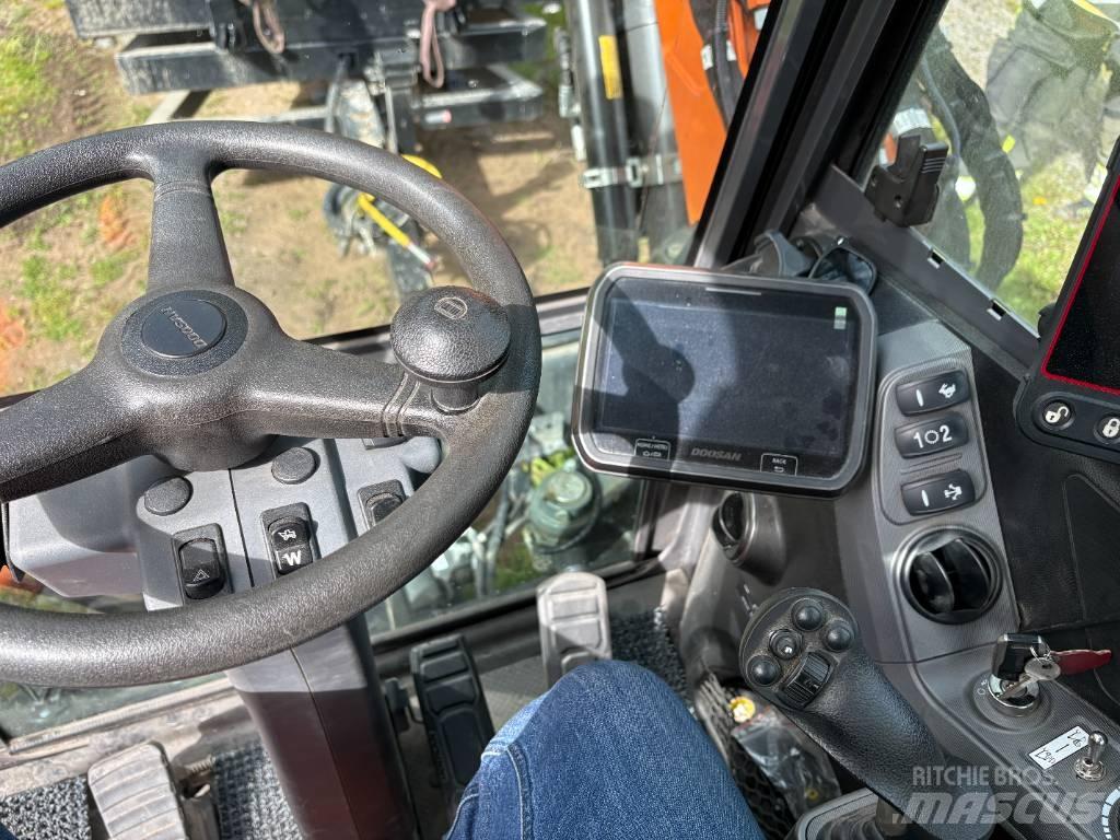 Develon DX 100 W-7 Gravemaskiner på hjul