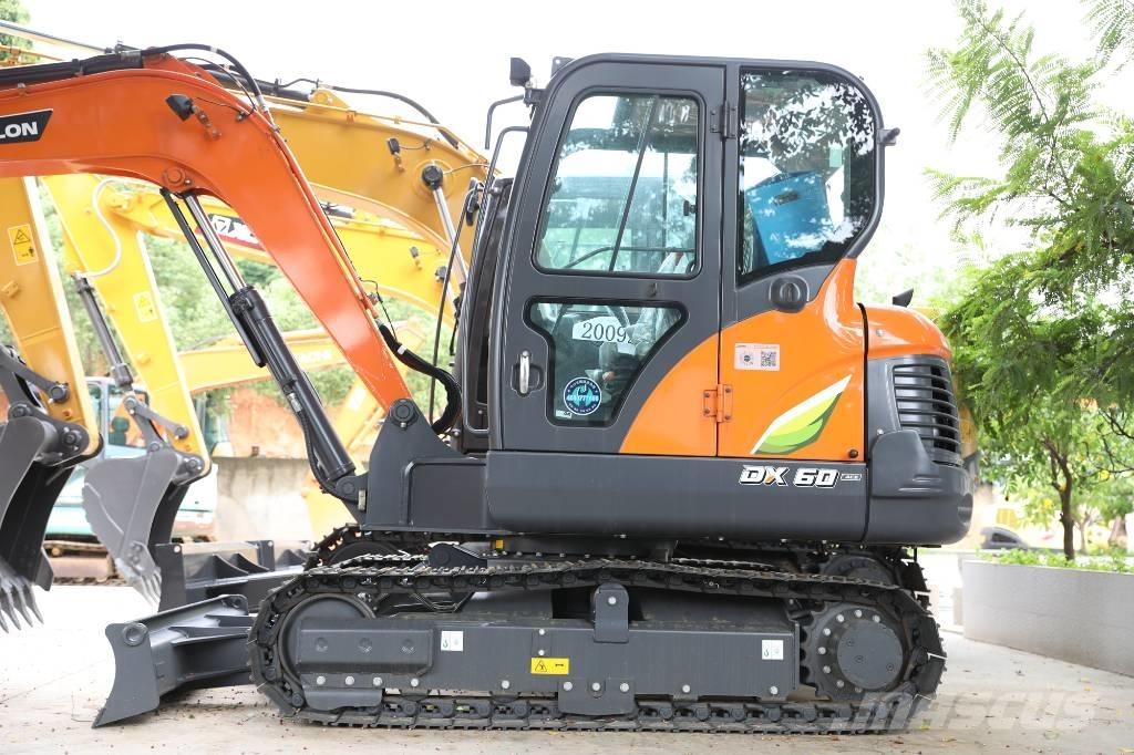 Develon DX 60 E-10 N Gravemaskiner på hjul