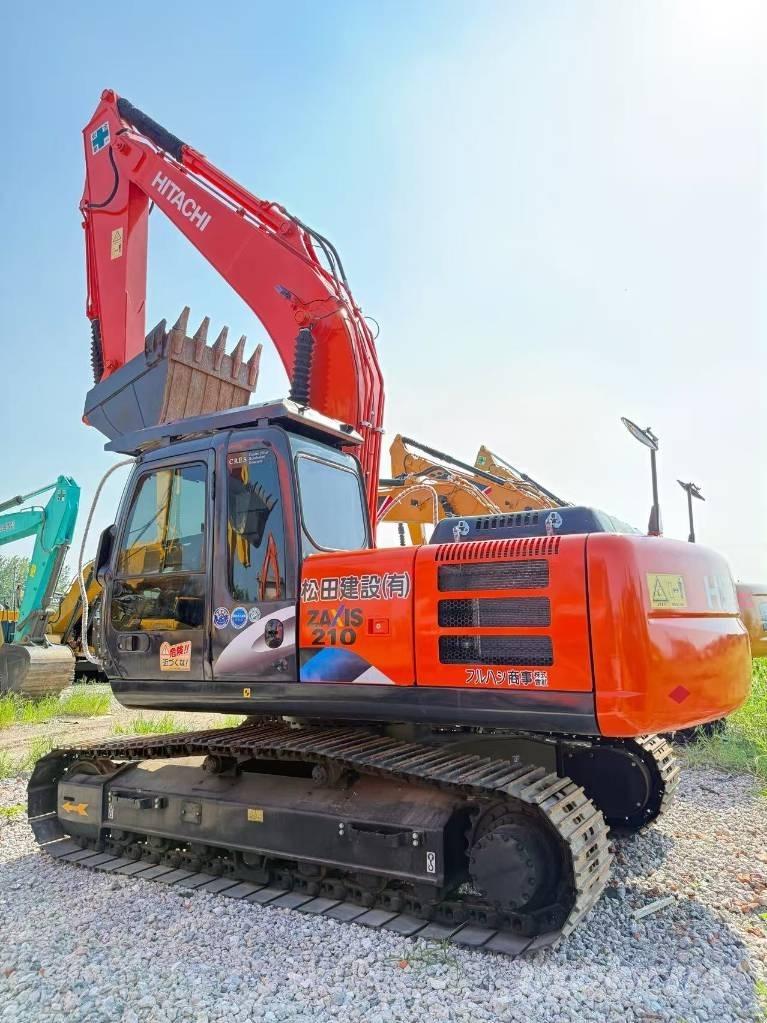 Hitachi ZX 210 Gravemaskiner på larvebånd