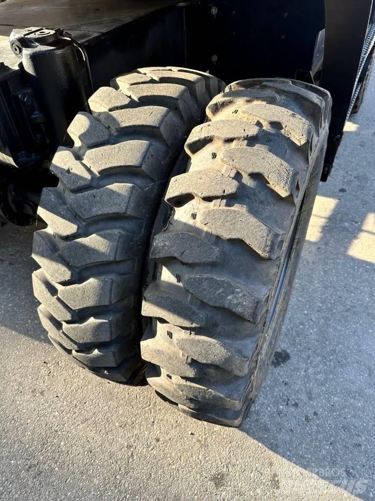 CAT M 318 F Gravemaskiner på hjul