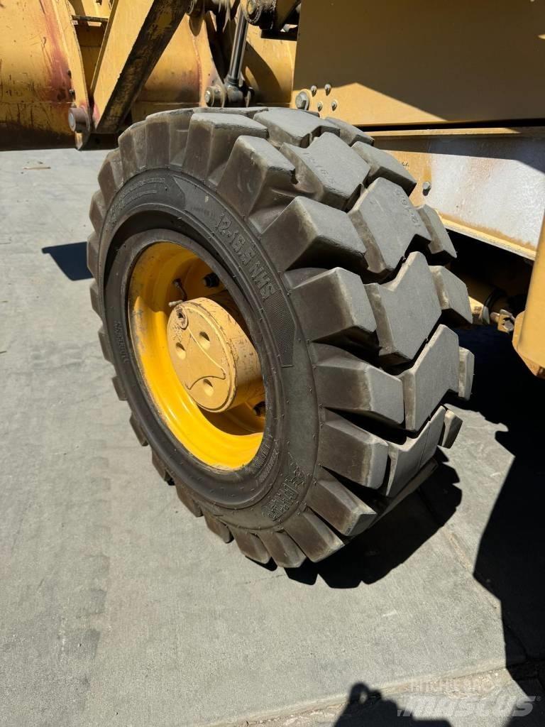 John Deere 310 G Rendegravere