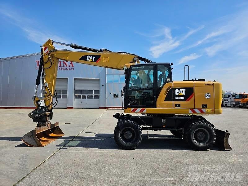 CAT M 318 F Gravemaskiner på hjul