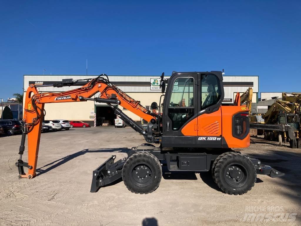 Develon DX 100 W-7 Gravemaskiner på hjul