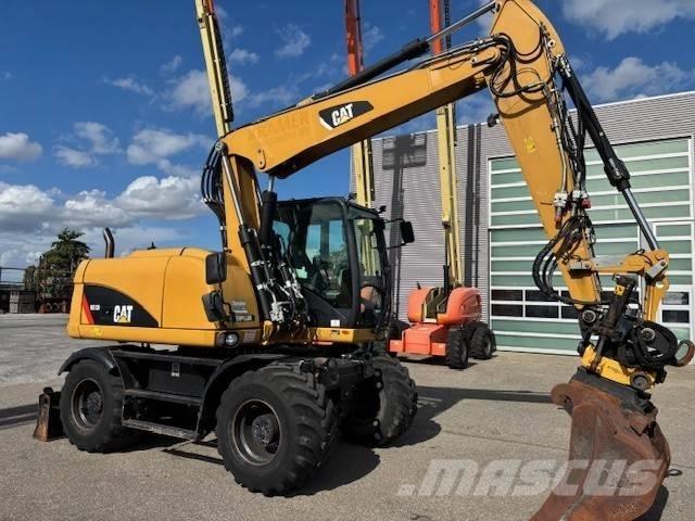 CAT M 313 D Gravemaskiner på hjul