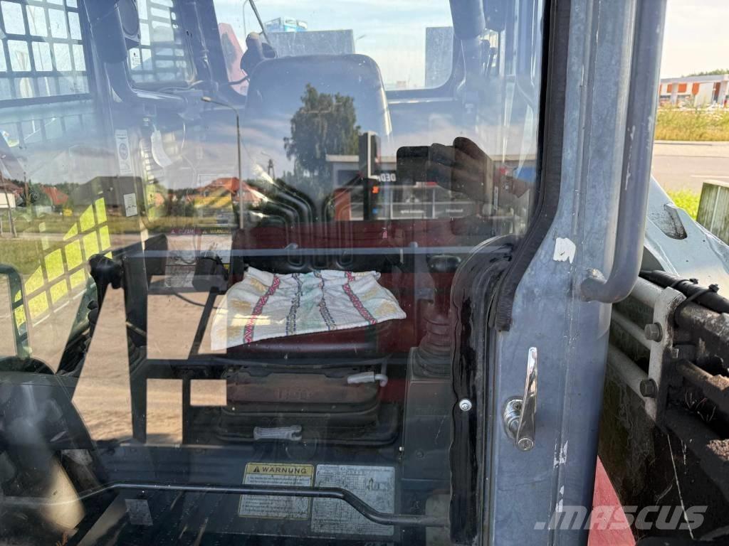 Takeuchi TL 250 Larvebåndslæssere
