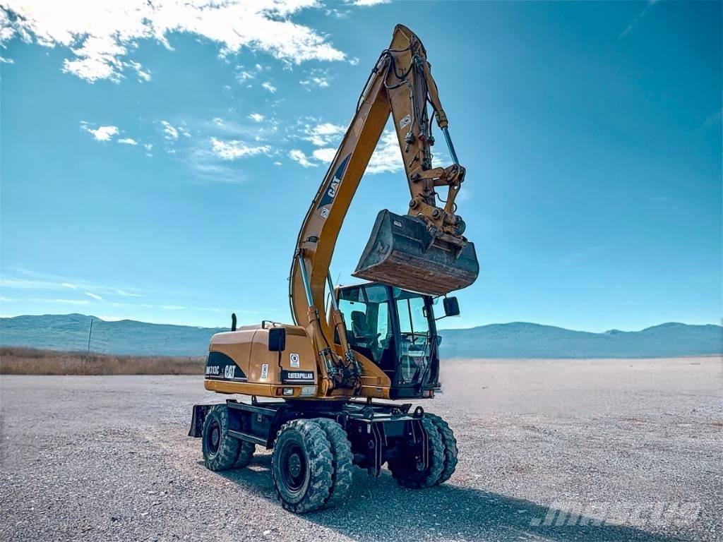 CAT M 313 C Gravemaskiner på hjul