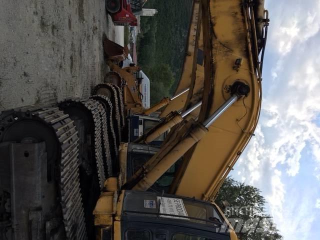 Komatsu 450 Gravemaskiner på larvebånd