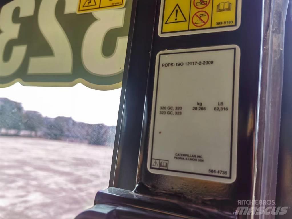 CAT 2022 CAT 323 Gravemaskiner på hjul