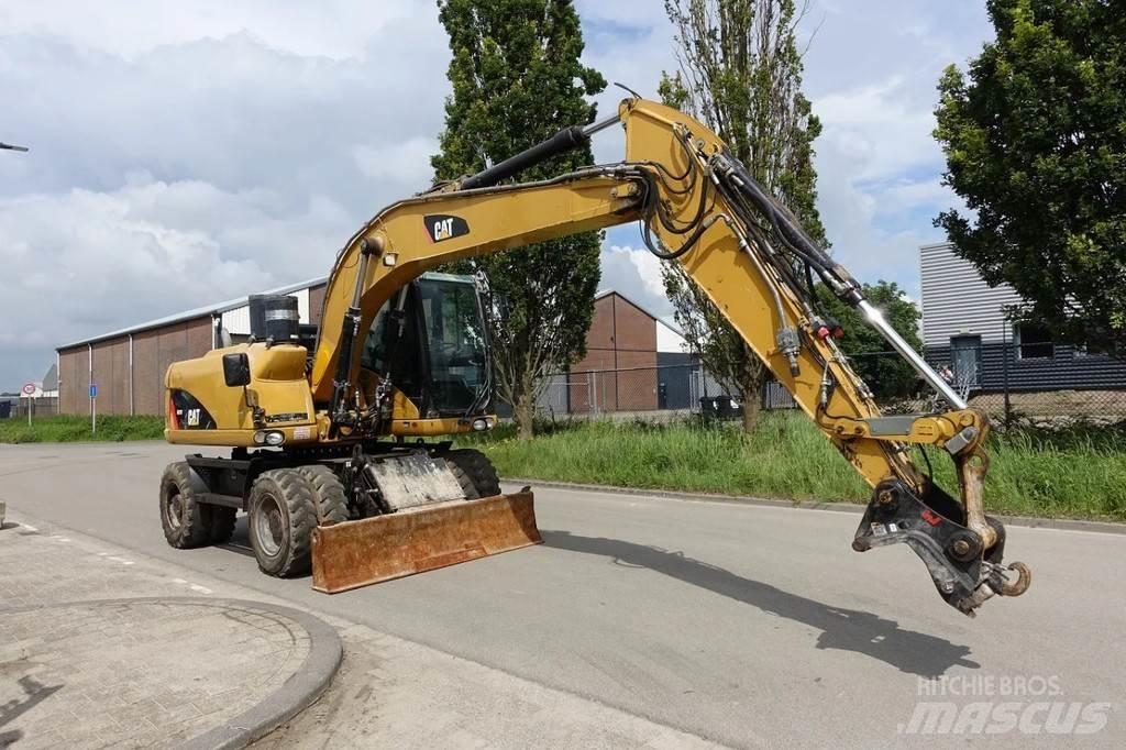 CAT M313 D Gravemaskiner på hjul