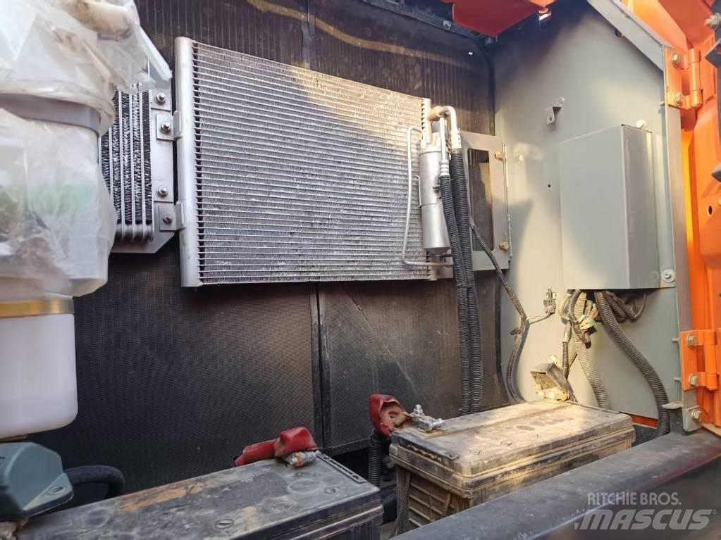 Hitachi ZX210 Gravemaskiner på larvebånd