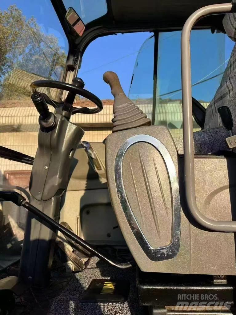 Hyundai 60 W Gravemaskiner på hjul
