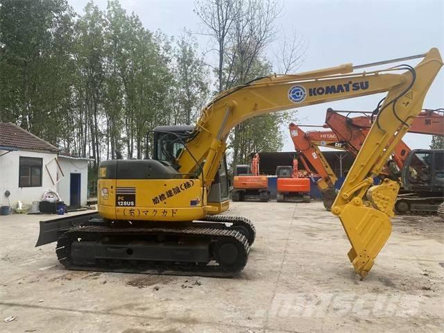 Komatsu PC128US Gravemaskiner på larvebånd