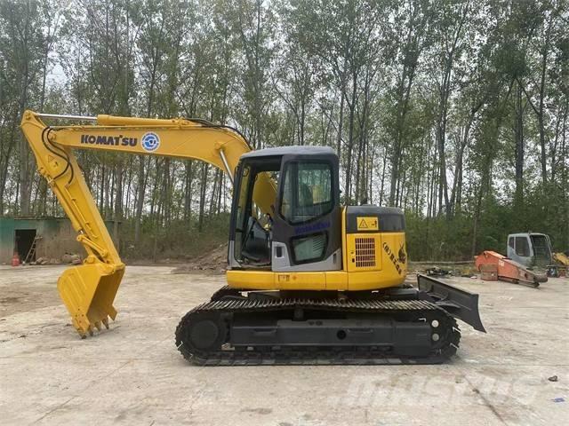 Komatsu PC128US Gravemaskiner på larvebånd