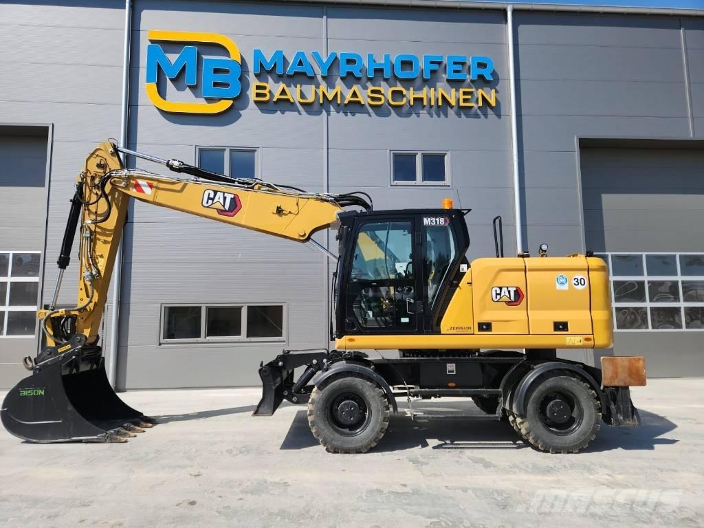 CAT M 318 Gravemaskiner på hjul