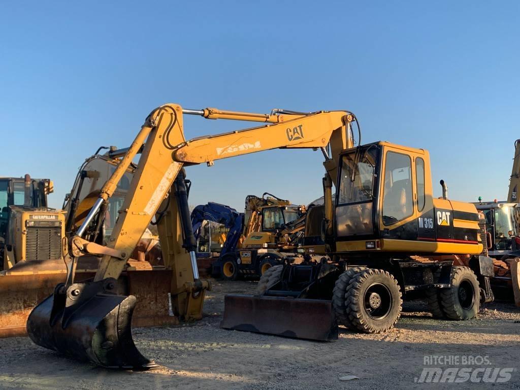 CAT M 315 Gravemaskiner på hjul