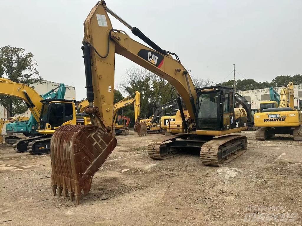 CAT 323D Gravemaskiner på larvebånd