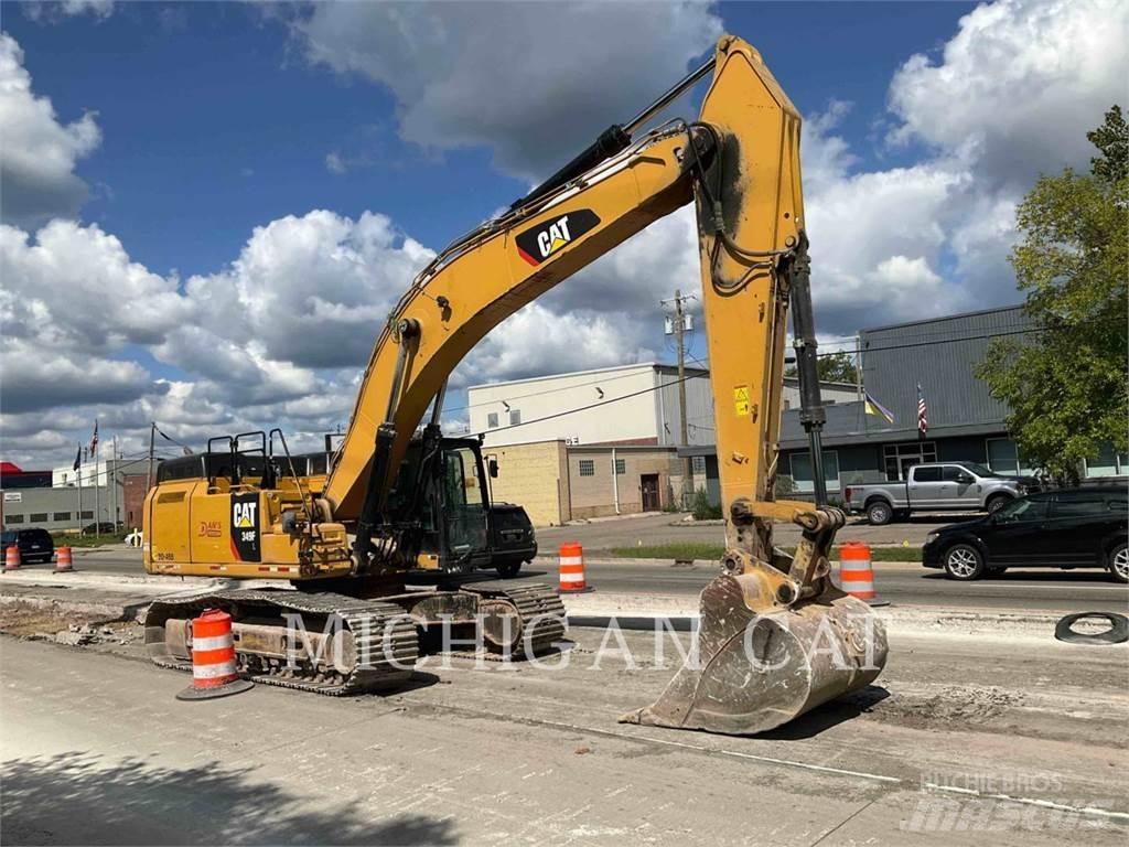 CAT 349FL + Gravemaskiner på larvebånd