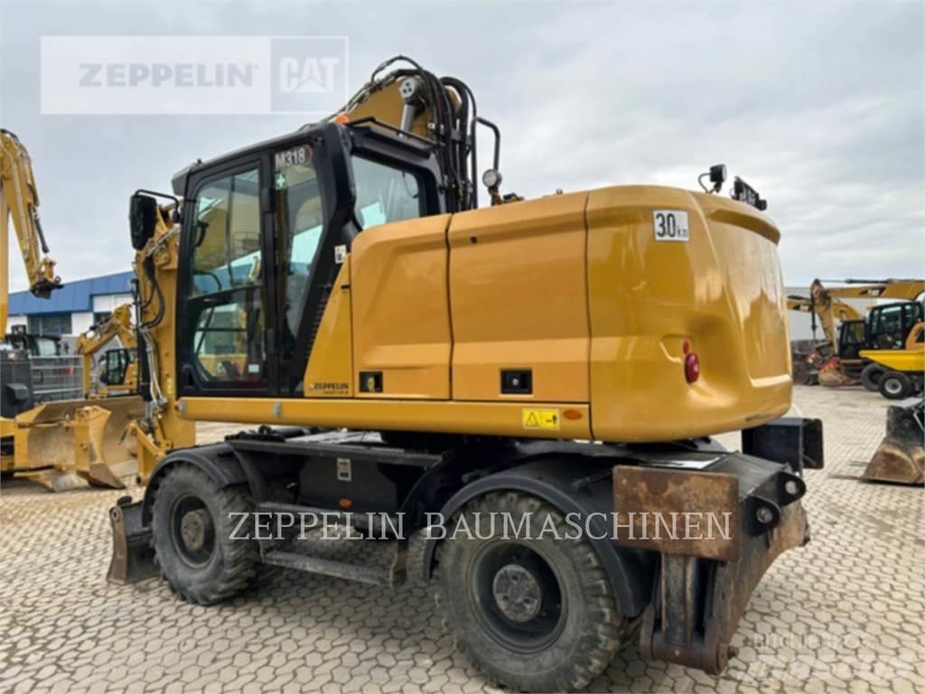 CAT M318-07A Gravemaskiner på hjul