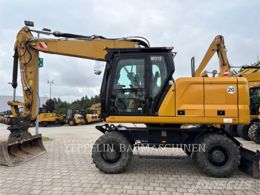 CAT M318-07A Gravemaskiner på hjul
