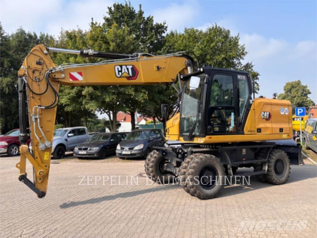 CAT M318-07A Gravemaskiner på hjul