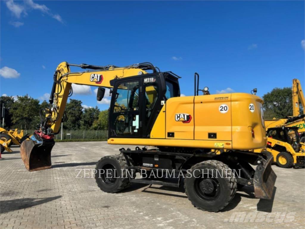 CAT M318-07A Gravemaskiner på hjul